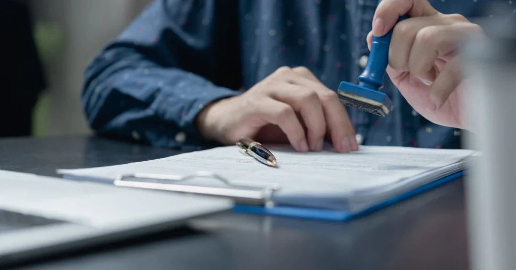 Person signing exotic pet permit documents